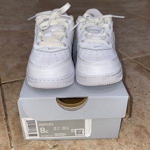 Nike Air Force ones. Size 8 kids.